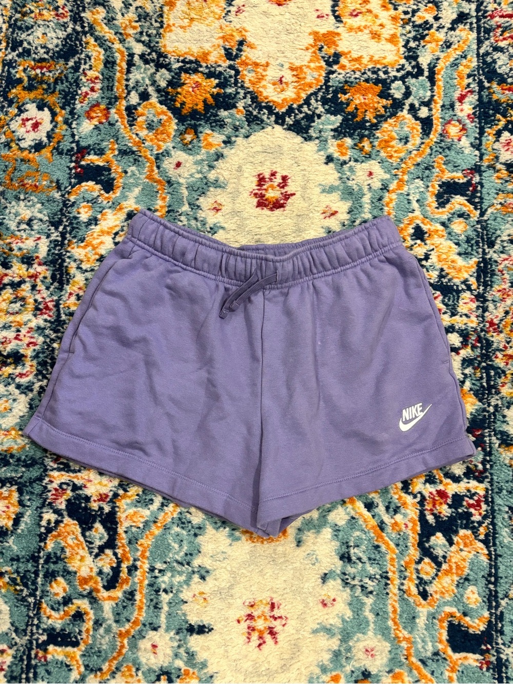 Nike Women’s Purple Athletic Shorts with White Swoosh